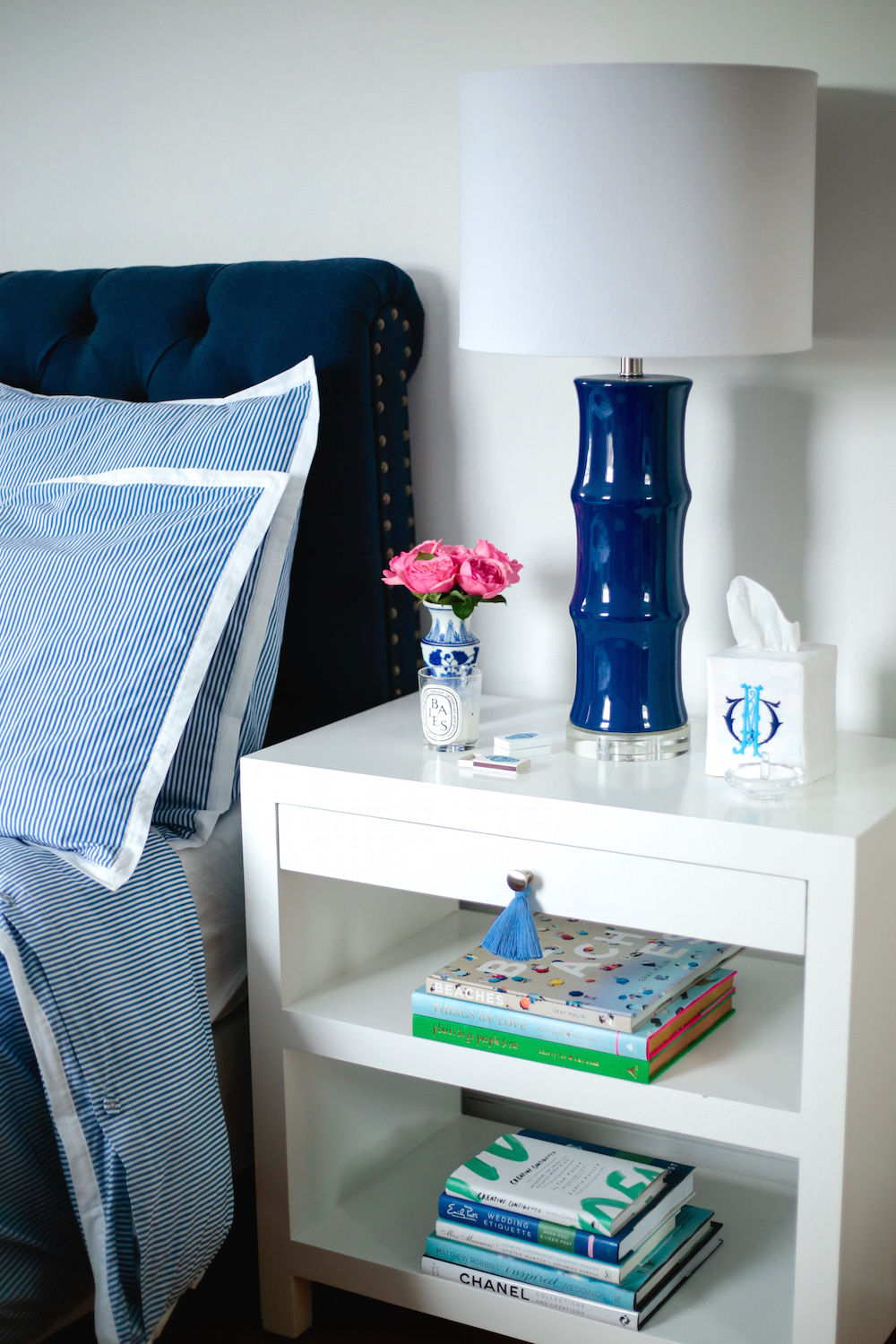 BEDSIDE TABLE WITH GINGER JAR MATCHES AND MONOGRAMMED TISSUE BOX COVER