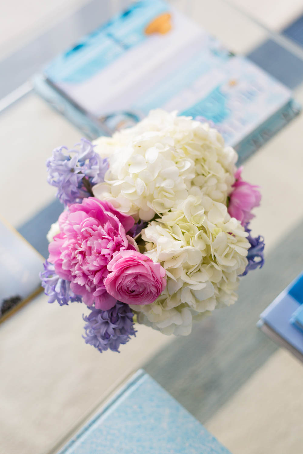 white hydrangeas pink peonies pink ranunculus and hyacinth copy