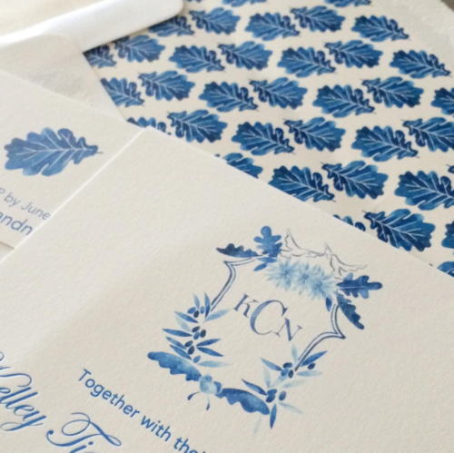 wedding invitations with watercolor crest by kearsley lloyd
