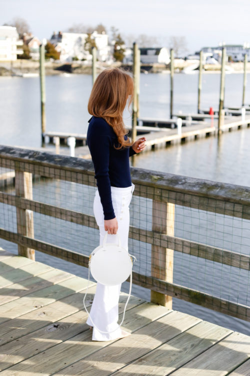 design darling wears ted baker navy bow sweater banana republic white sailor jeans clare v white circle alistair bag