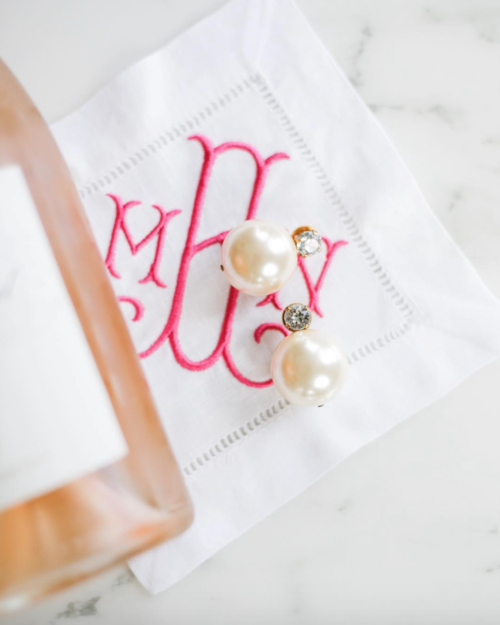 tory burch faux pearl drop earrings and monogrammed cocktail napkins from easy
