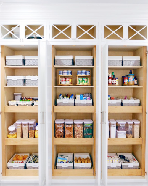 organized pantry with baskets the home edit
