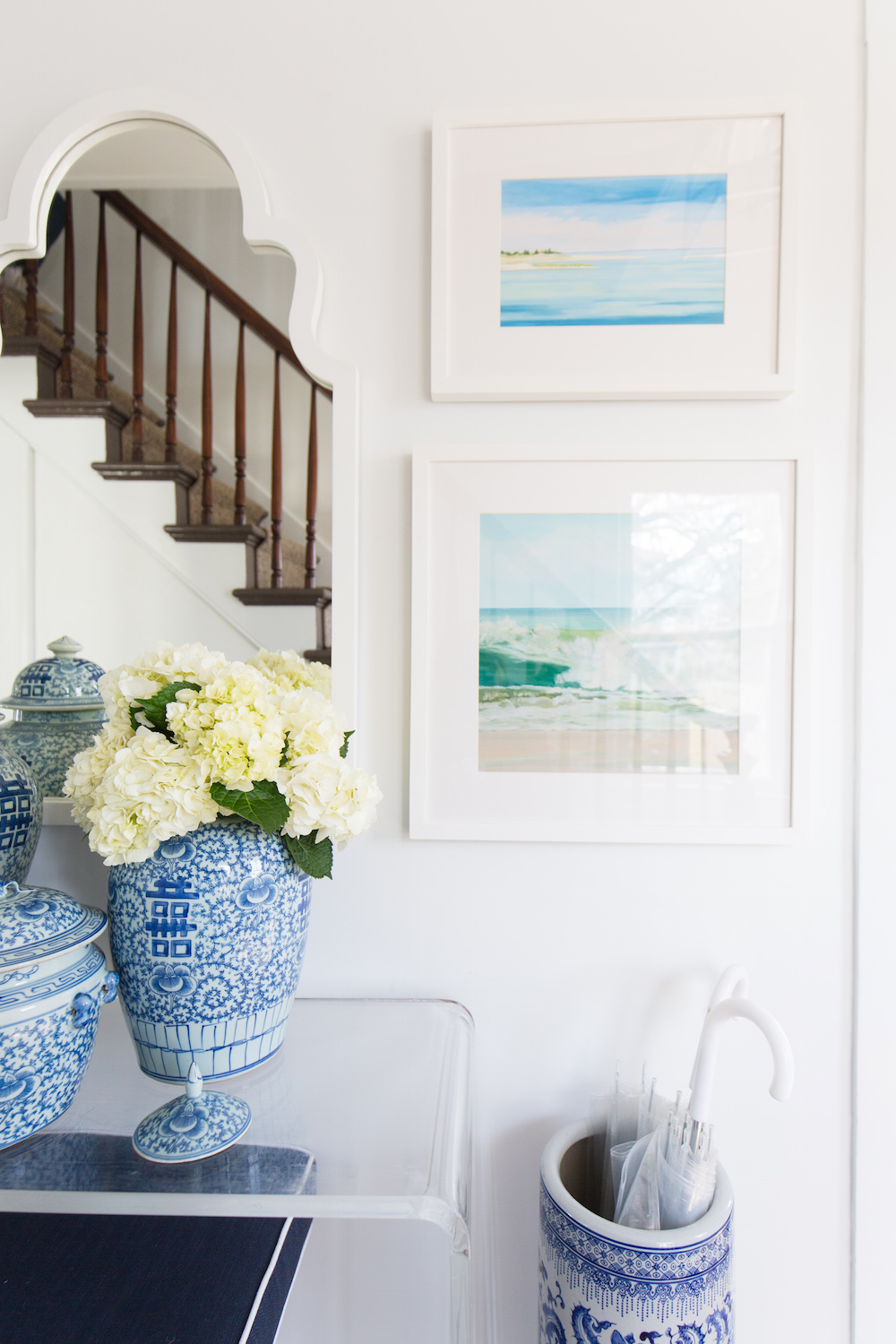 design darling foyer with acrylic console