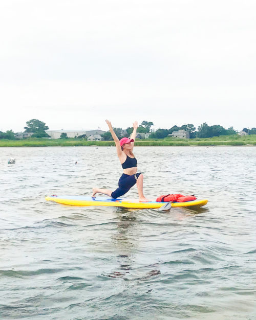 stand up paddleboard yoga with paddle nantucket