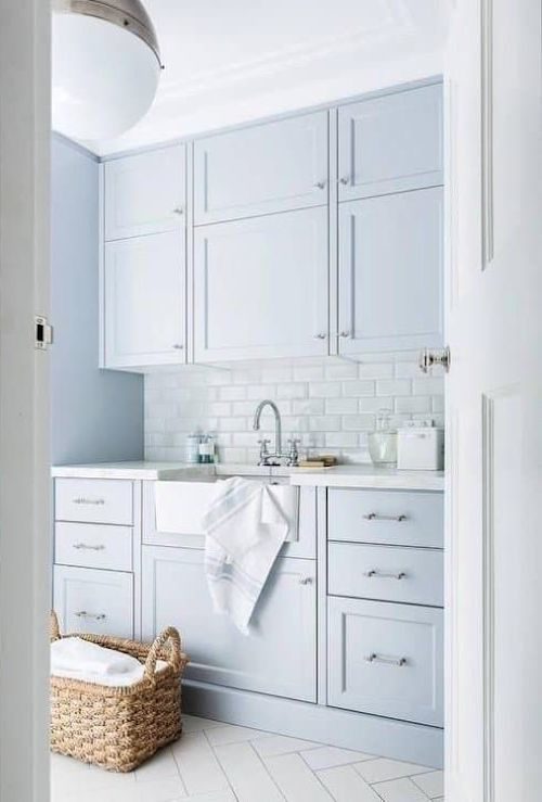 light blue laundry room cabinets - Design Darling