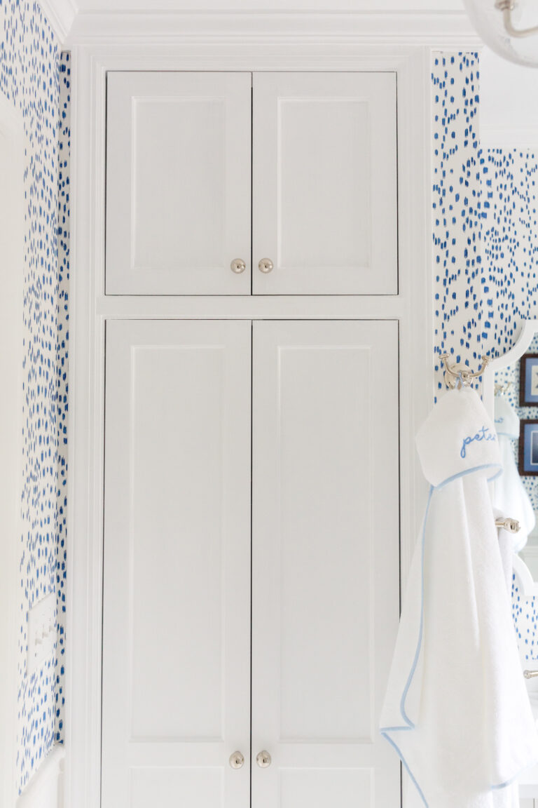 bathroom linen closet with Baldwin Estate 1-1:4 Inch Round Cabinet Knobs