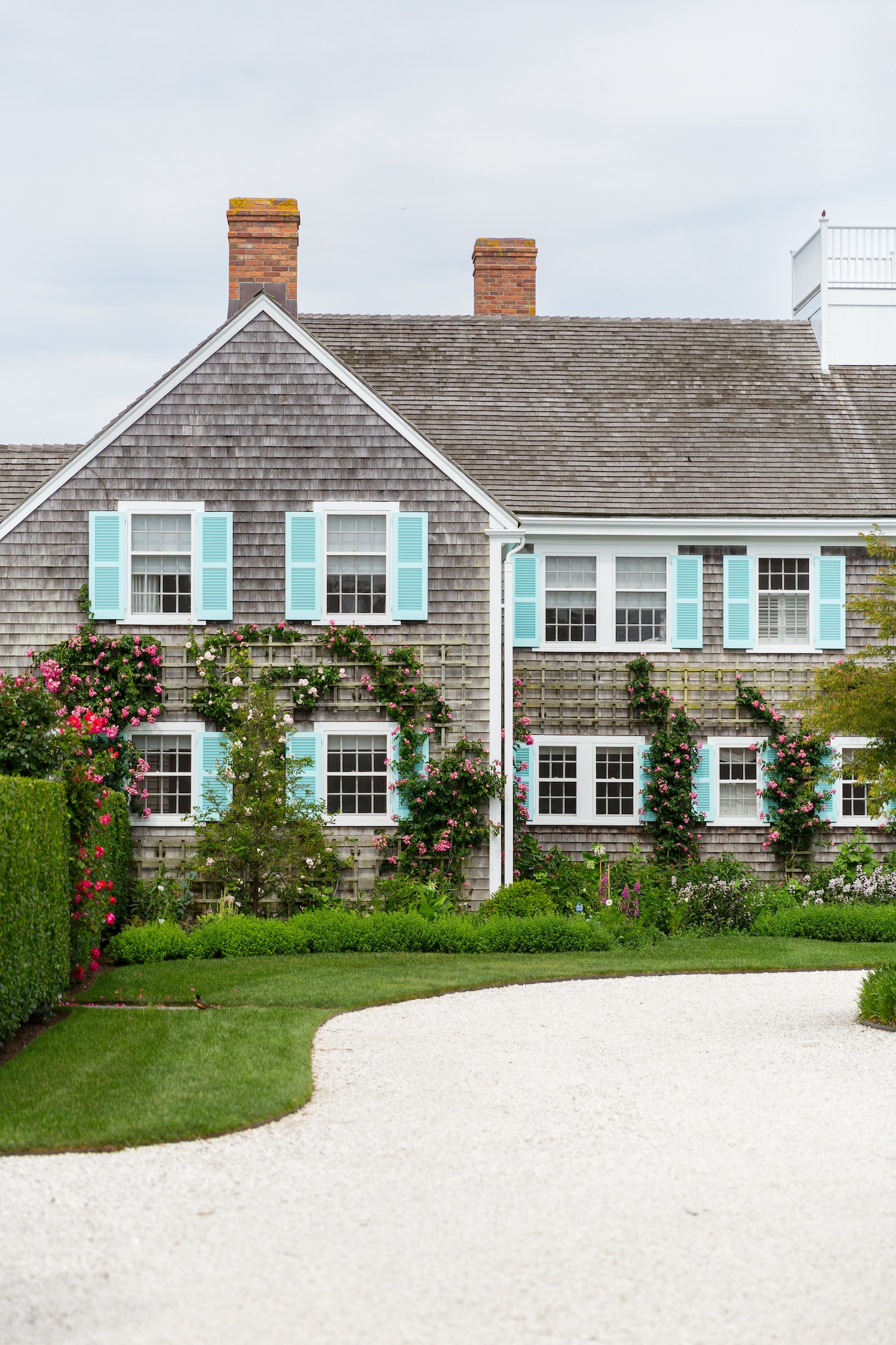 house with turquoise shutters nantucket